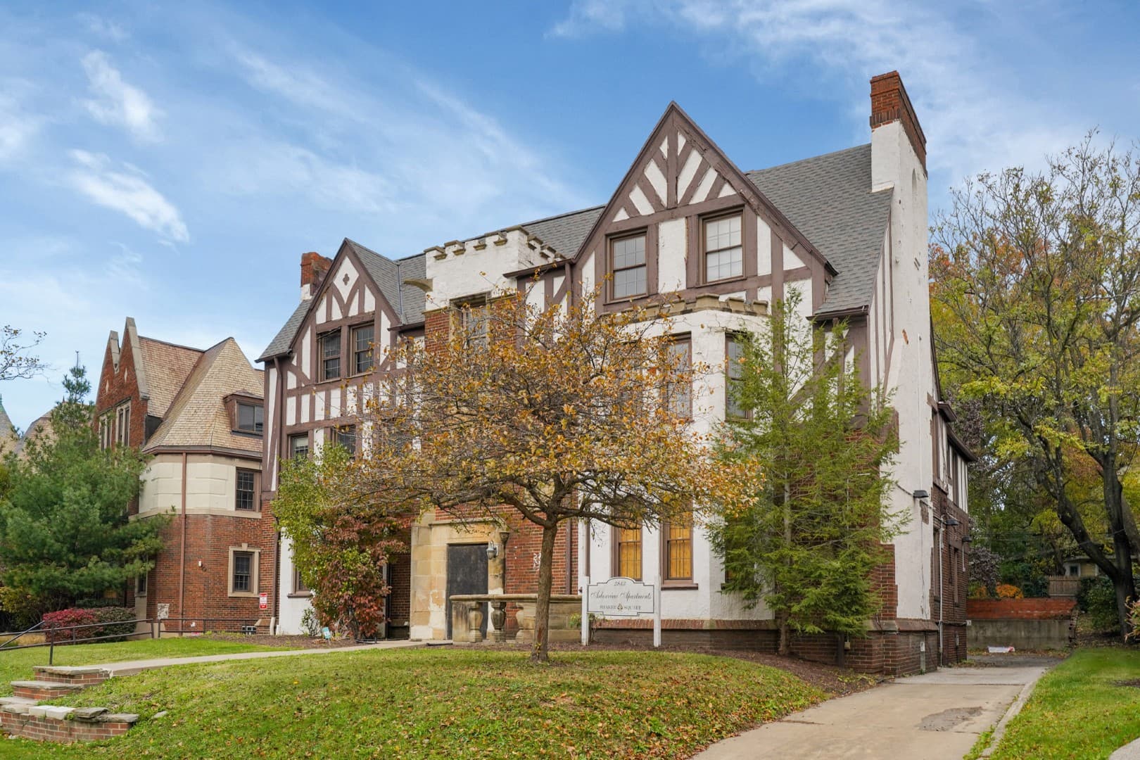 Tudor-style apartment building with half-timbered gables