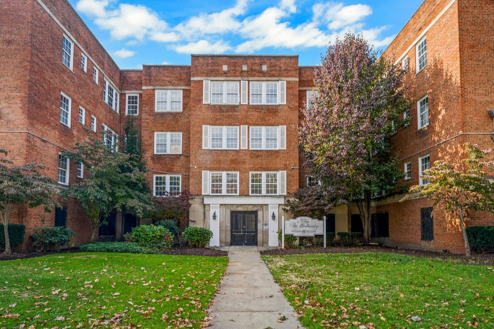 Landscaped courtyard entry of a 1928 apartment building